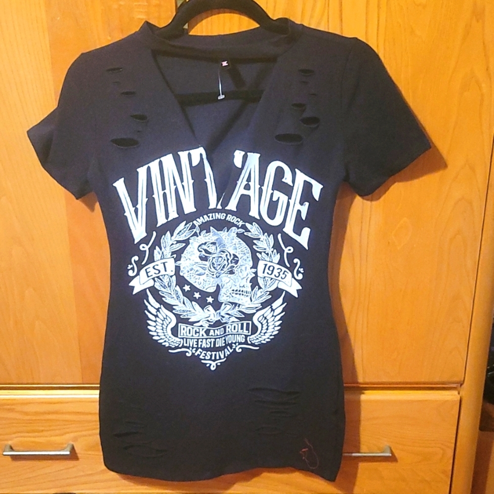 Black V neck mini dress with cute cut-outs. Size M.